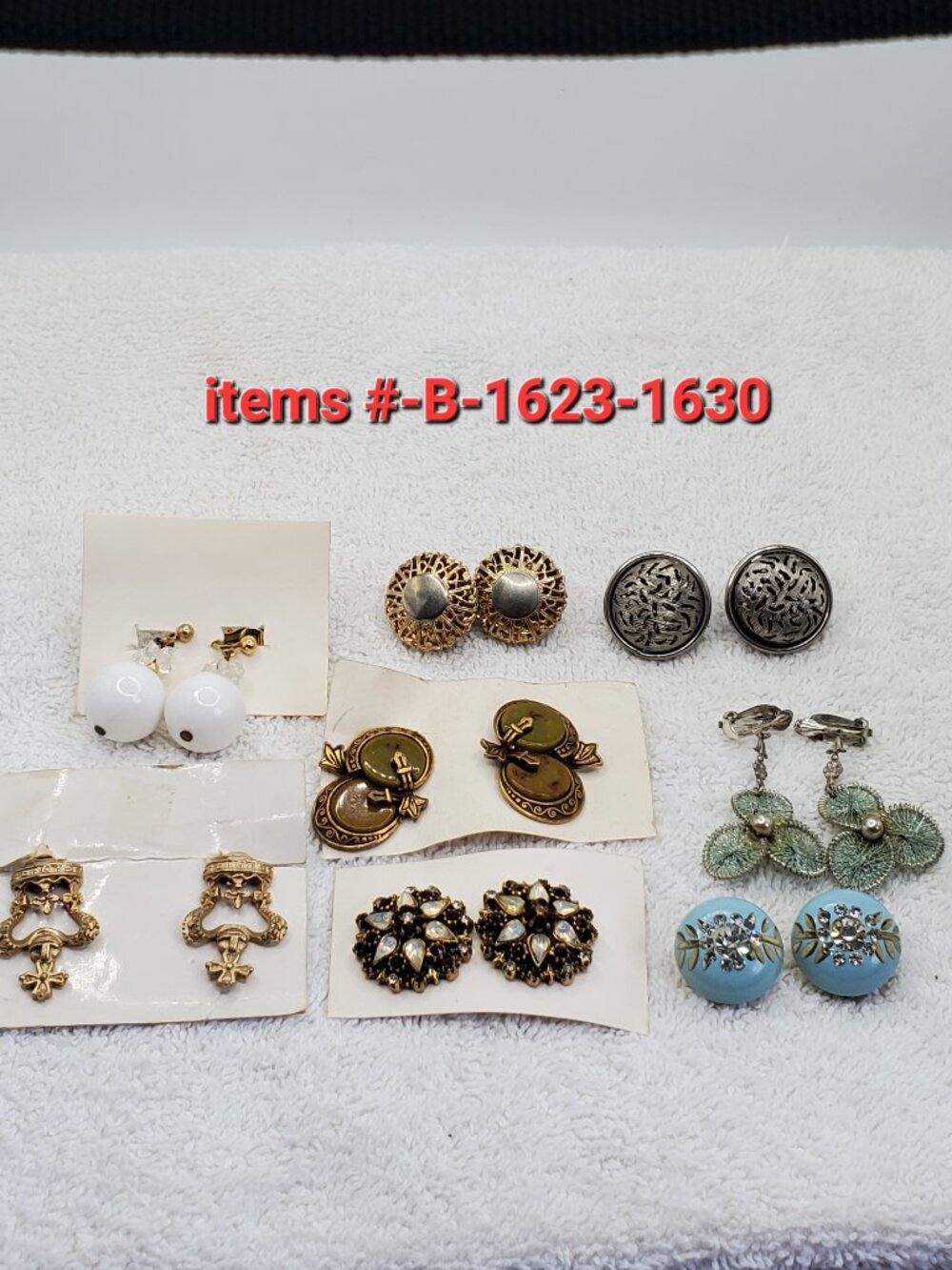8 Pair of clip on Earrings,. item # B-1623-1630,. wt. 89 grams.